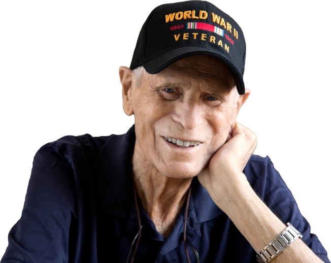 veteran smiling with hand on face